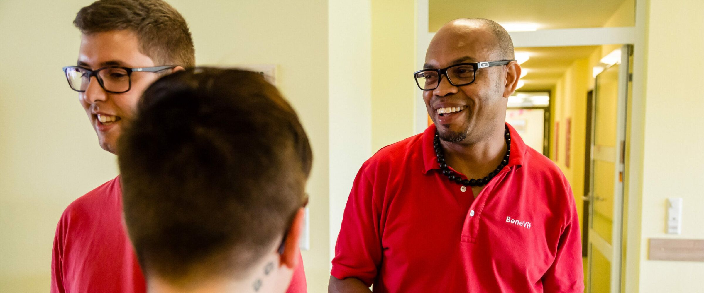 Lachende BeneVit Mitarbeiter