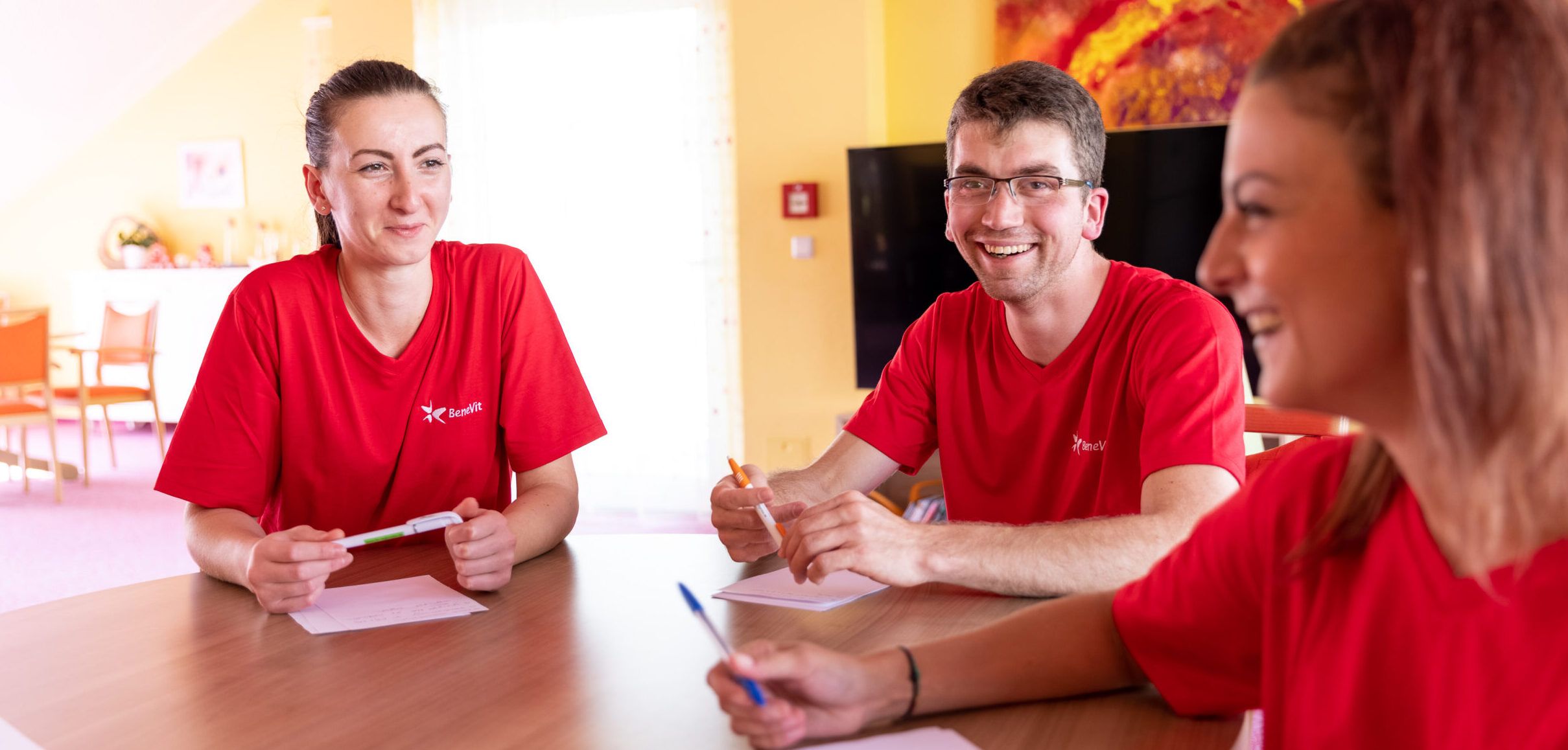 BeneVit Mitarbeiter bei Teambesprechungen